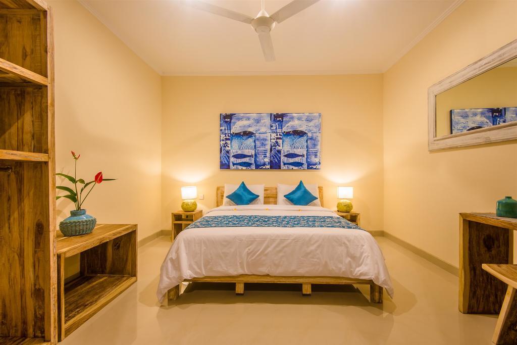 Villa Tepi Sungai Legian Oda fotoğraf