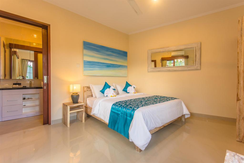 Villa Tepi Sungai Legian Oda fotoğraf