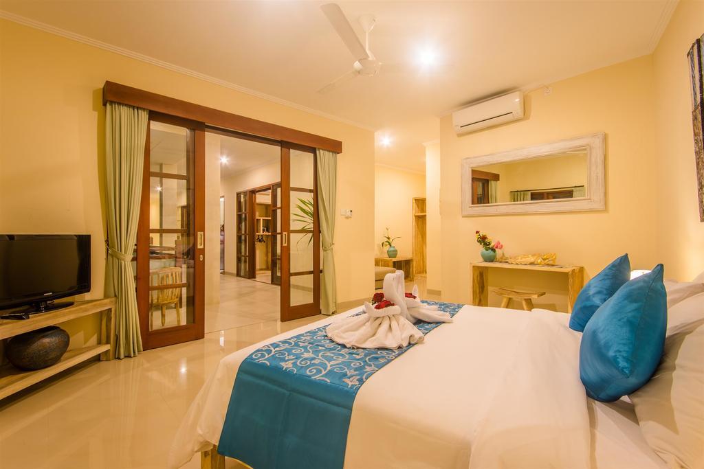 Villa Tepi Sungai Legian Oda fotoğraf
