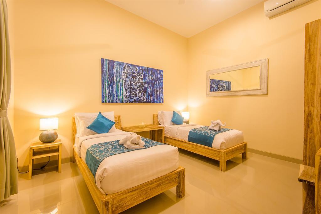 Villa Tepi Sungai Legian Oda fotoğraf