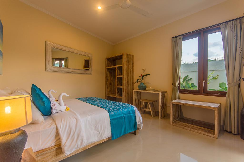 Villa Tepi Sungai Legian Oda fotoğraf