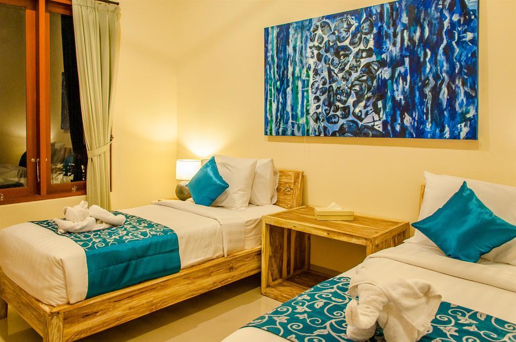 Villa Tepi Sungai Legian Oda fotoğraf